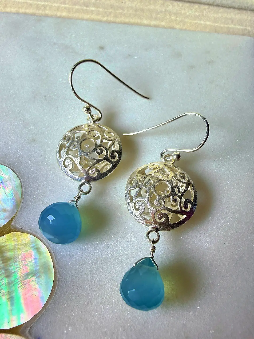 Jheel rhodium-plated silver drop earrings with pierced filigree domes and blue chalcedony briolettes